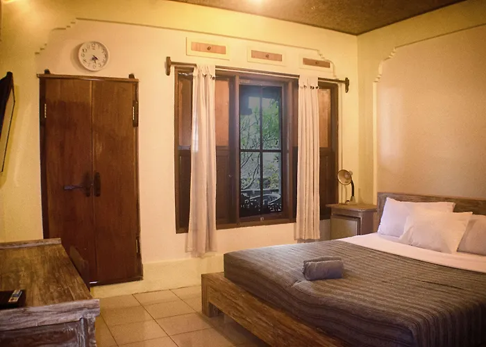 Quarto em Acomodações Particulares Rumah Roda *