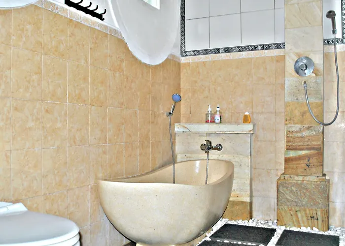 Quarto em Acomodações Particulares Rumah Roda Ubud